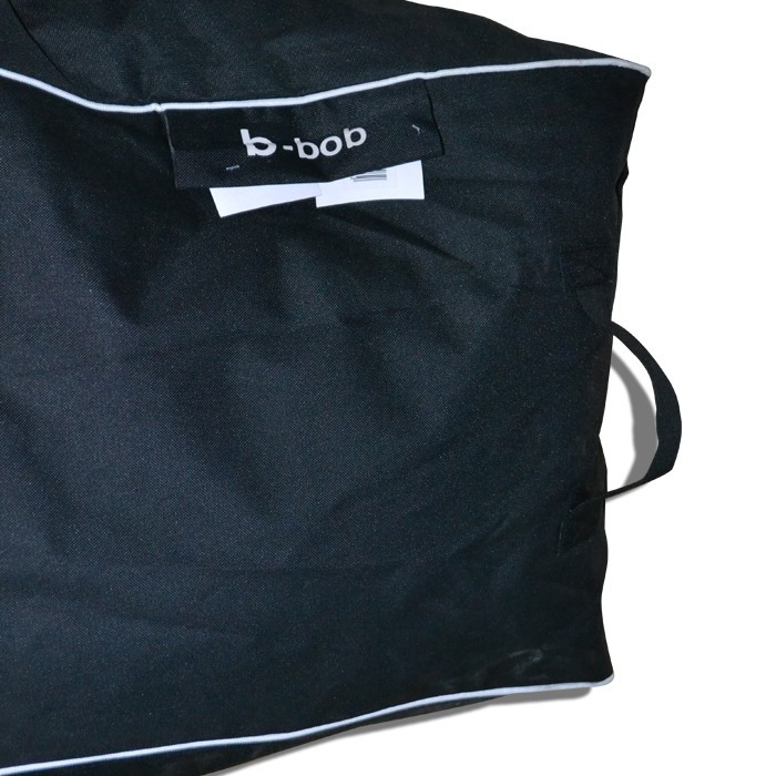 pouf sac assise banane noir poignet